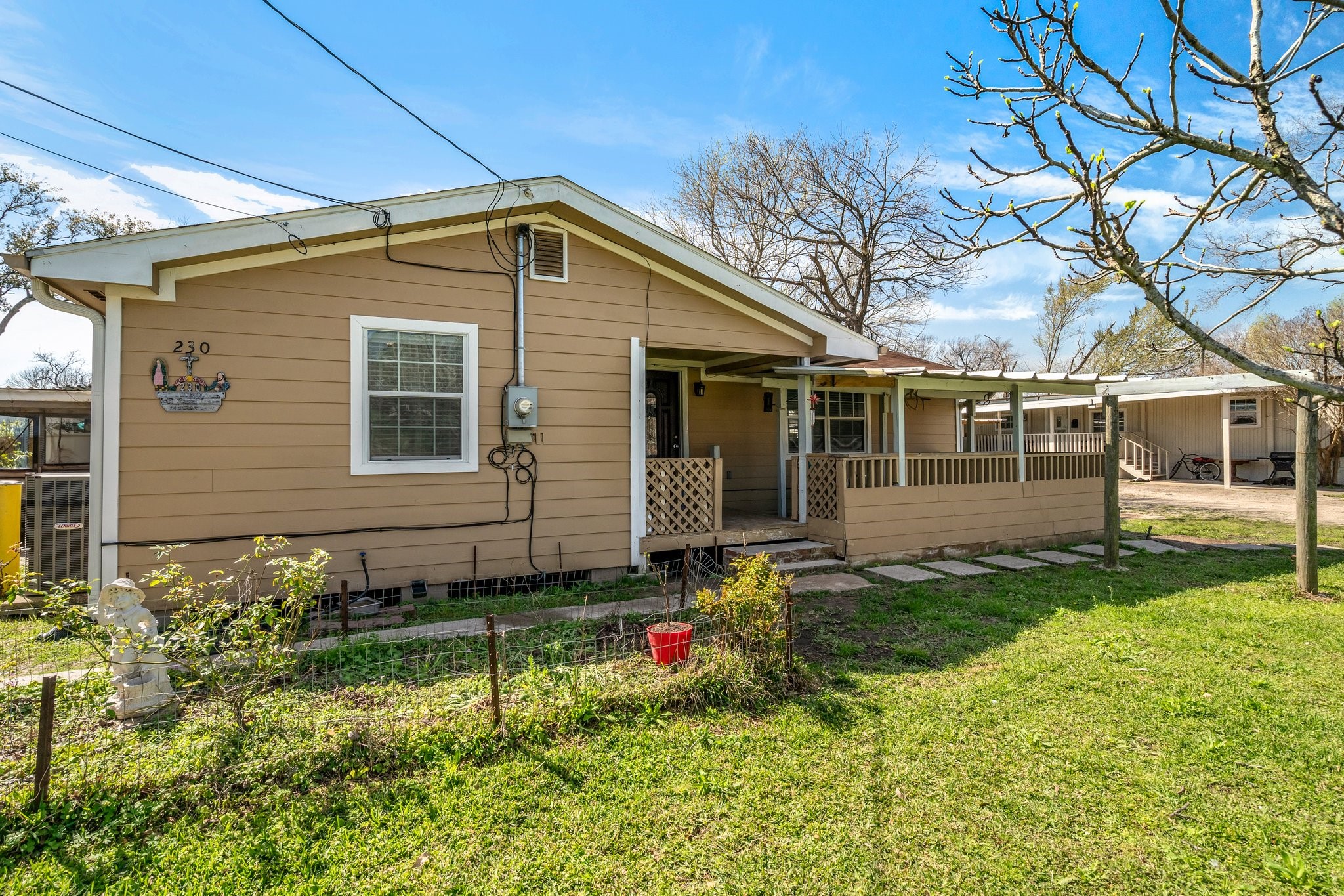 230 Busch Street Houston, TX 77060 - Photo 3 of 34 a view of a house with a yard