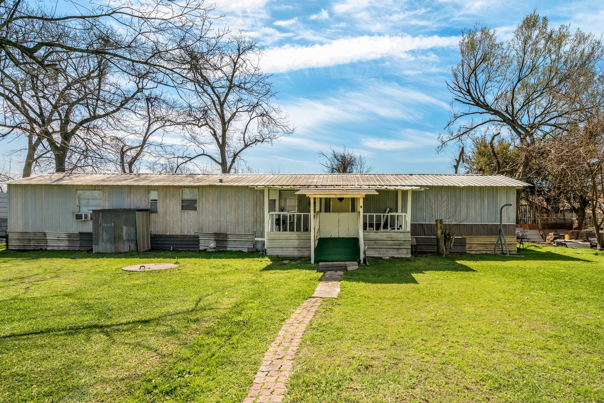 230 Busch Street Houston, TX 77060 - Photo 33 of 34 a view of a house with swimming pool and a yard