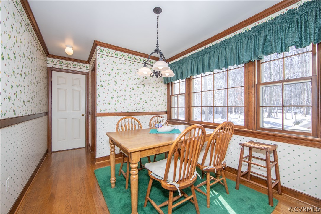 2000 Albion Road Midlothian, VA 23113 - Photo 13 of 39 a view of a dining room with furniture window and wooden floor