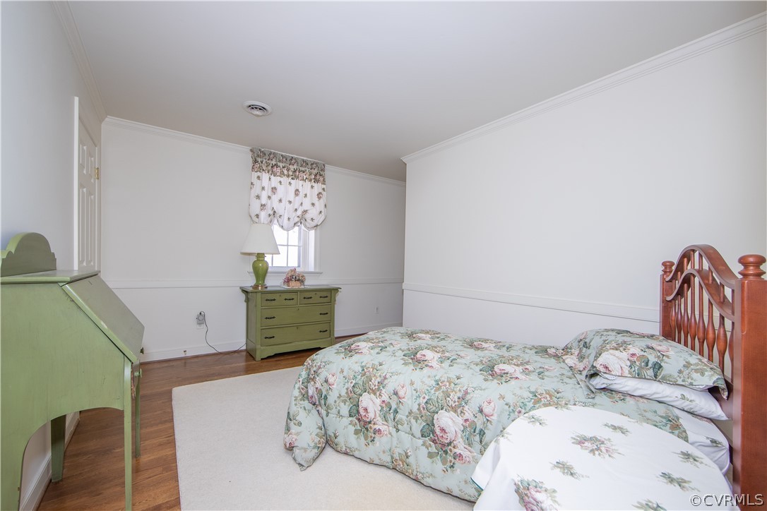 2000 Albion Road Midlothian, VA 23113 - Photo 23 of 39 a bedroom with a bed and a dresser