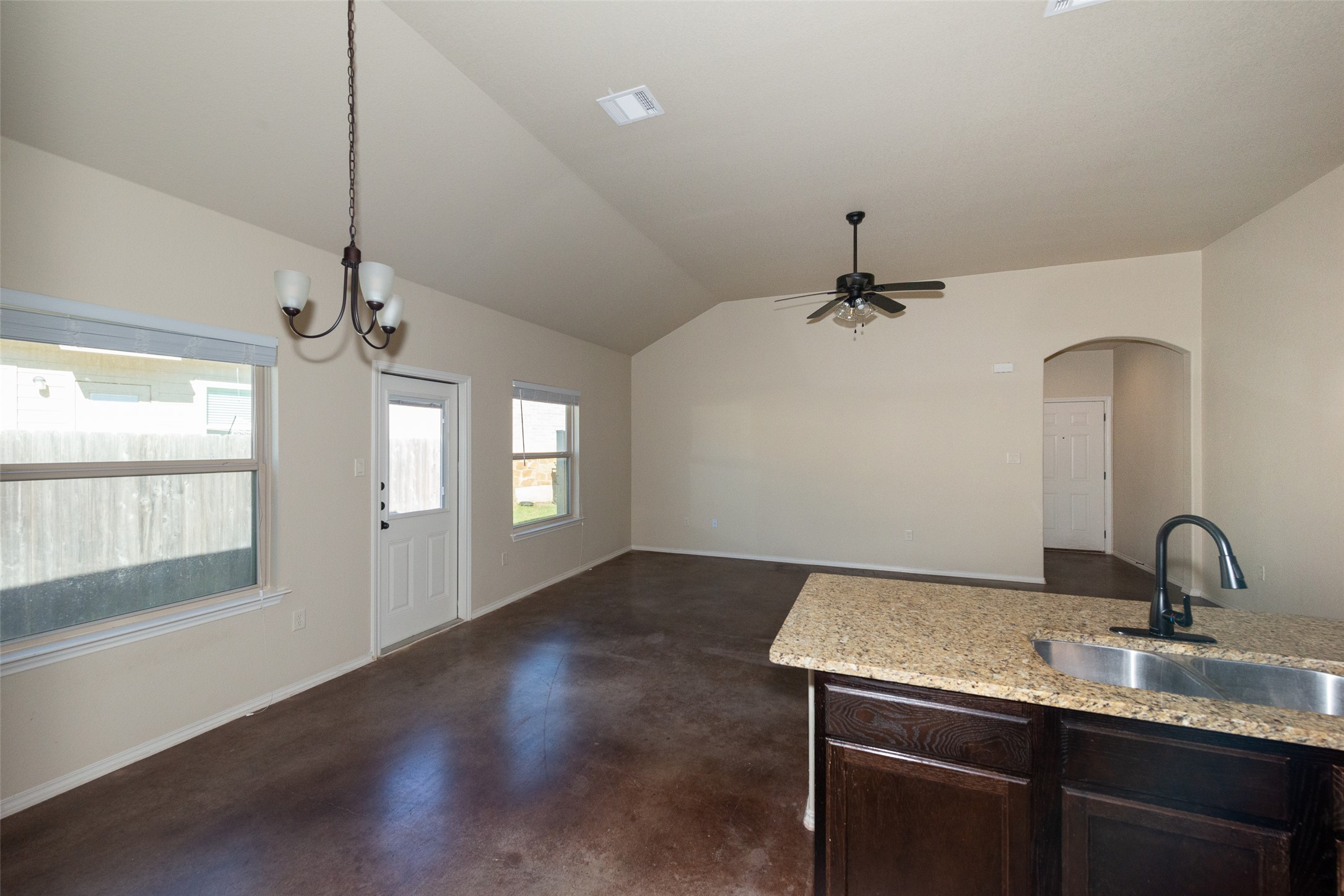 245 Joanne Loop, Unit B Buda, TX 78610 - Photo 8 of 33 Looking back from kitchen to main living area