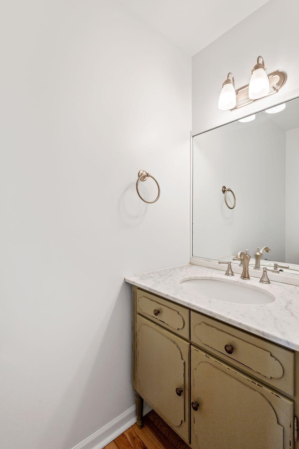 1741 East 106th Place Crown Point, IN 46307 - Photo 13 of 34 a bathroom with a sink and mirror