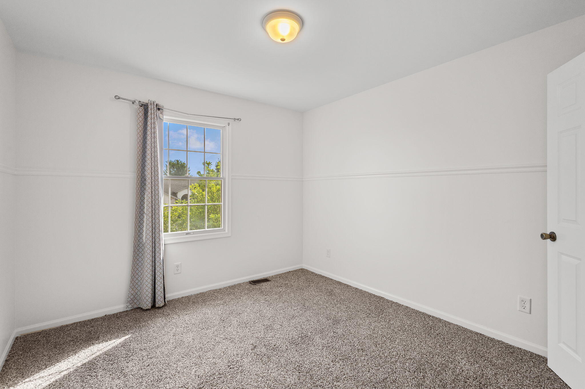 1741 East 106th Place Crown Point, IN 46307 - Photo 16 of 34 an empty room with windows and closet