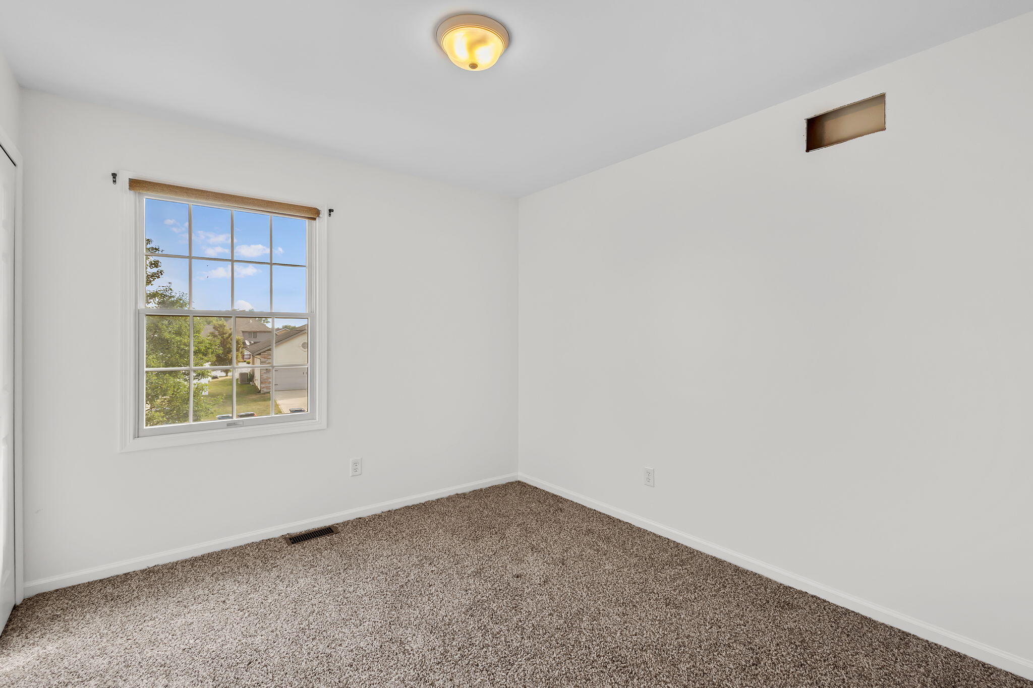 1741 East 106th Place Crown Point, IN 46307 - Photo 18 of 34 an empty room with a window