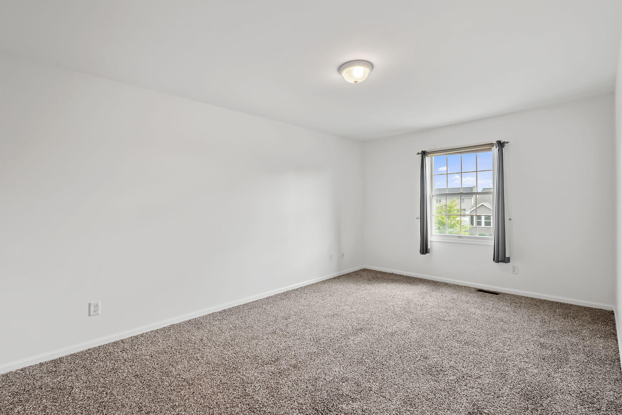 1741 East 106th Place Crown Point, IN 46307 - Photo 21 of 34 an empty room with windows