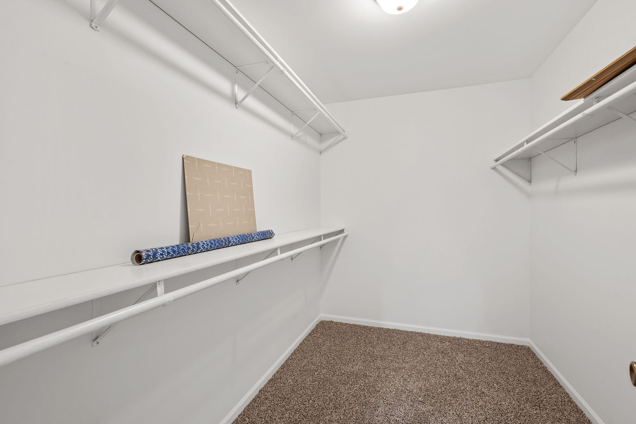 1741 East 106th Place Crown Point, IN 46307 - Photo 23 of 34 a view of a room with rack on the wall
