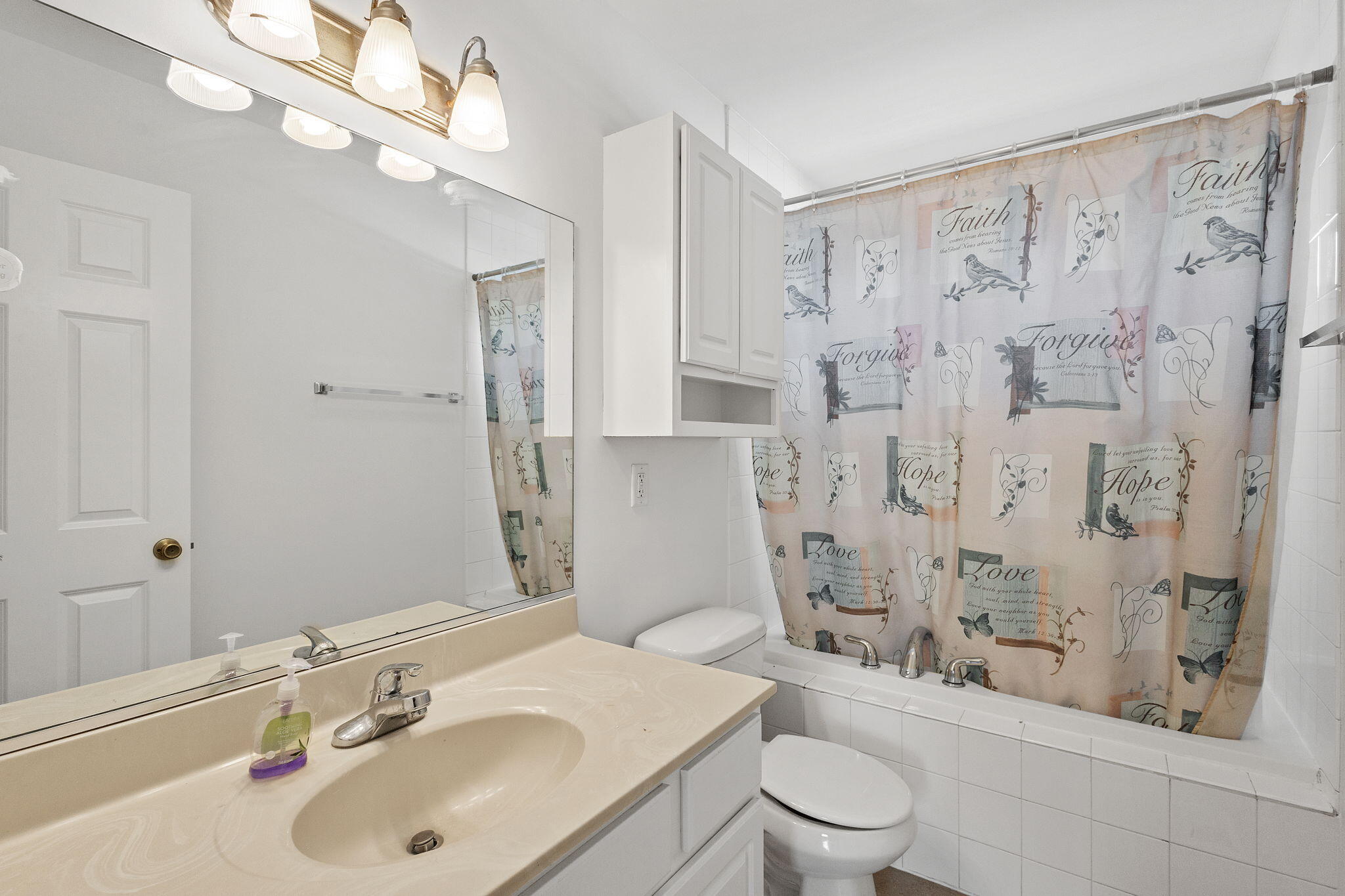 1741 East 106th Place Crown Point, IN 46307 - Photo 24 of 34 a bathroom with a sink a toilet and shower