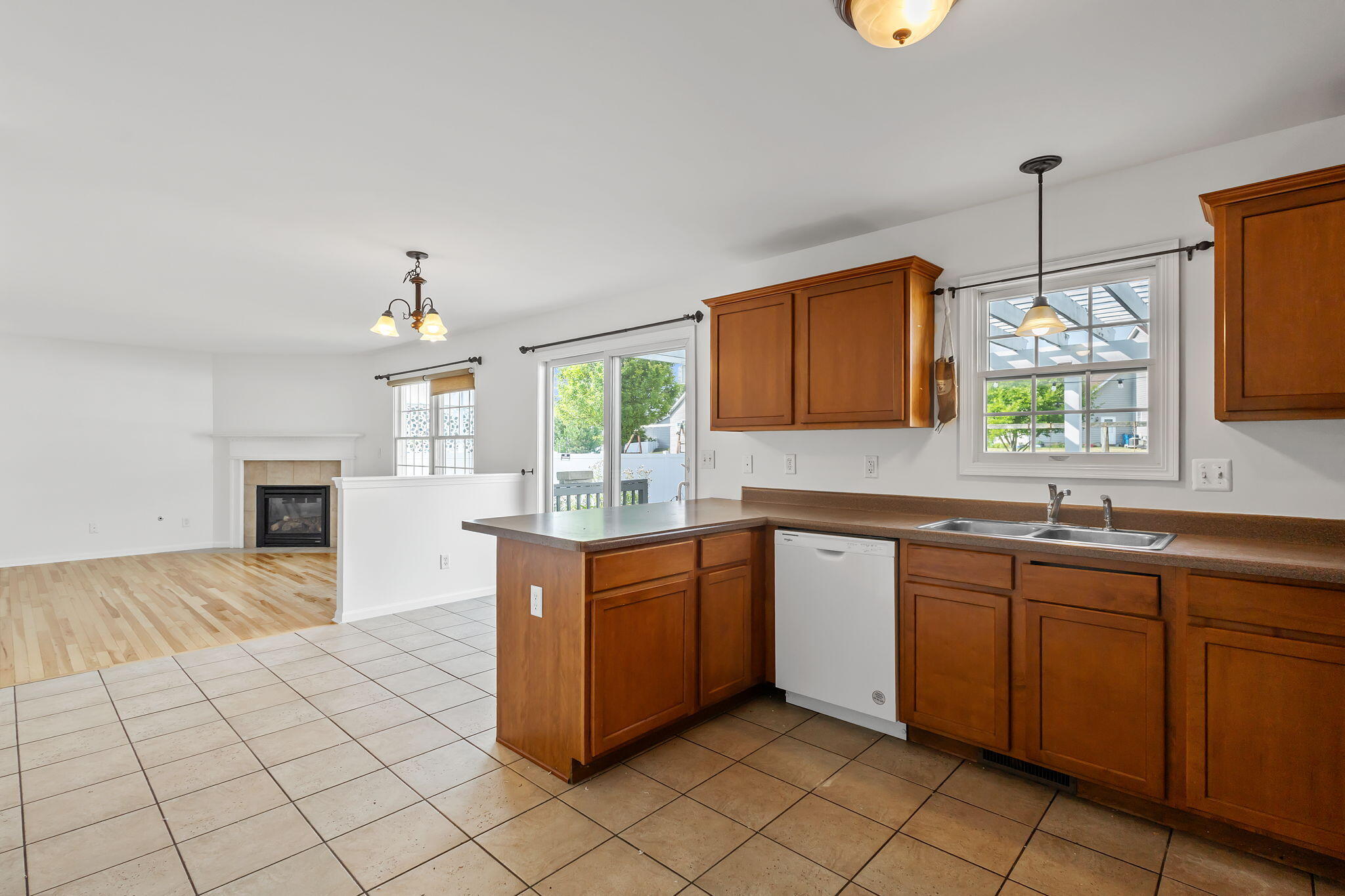 1741 East 106th Place Crown Point, IN 46307 - Photo 3 of 34 a kitchen with stainless steel appliances granite countertop a sink and cabinets