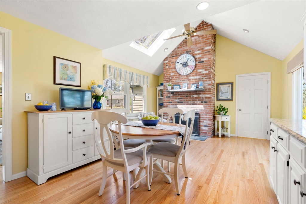 9 Davis Road Hudson, MA 01749 - Photo 11 of 32 a view of a dining room with furniture and wooden floor