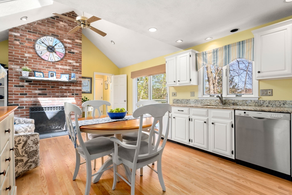 9 Davis Road Hudson, MA 01749 - Photo 12 of 32 a kitchen with stainless steel appliances granite countertop a stove a sink and a refrigerator