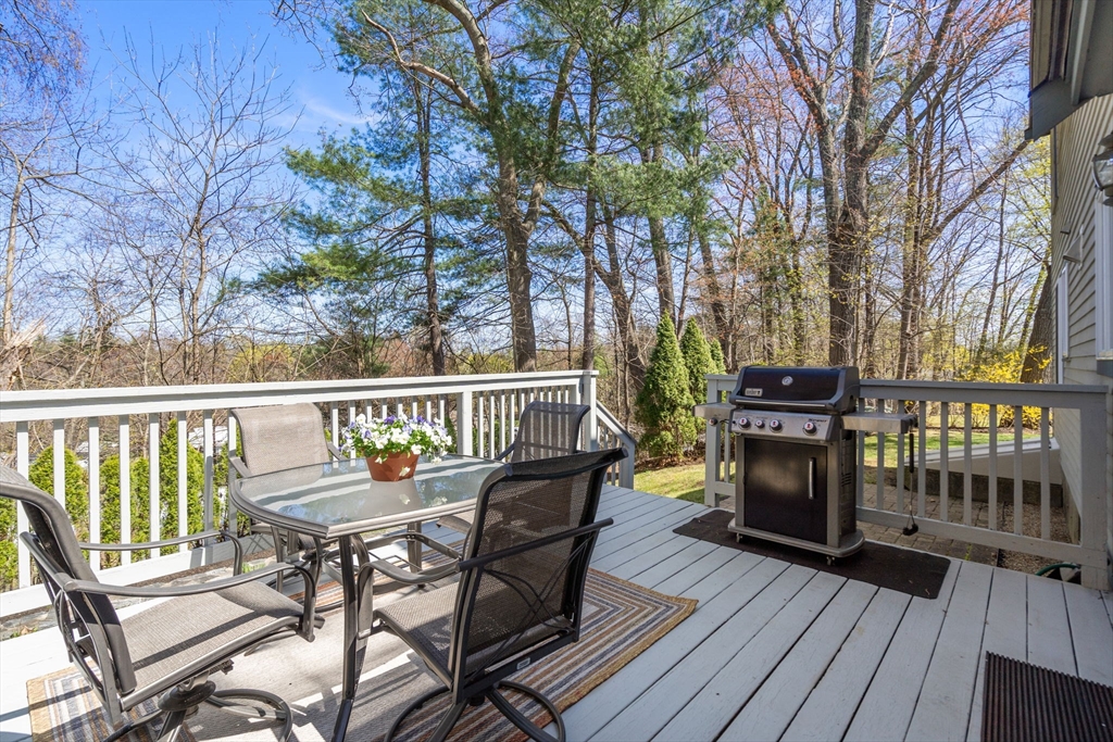9 Davis Road Hudson, MA 01749 - Photo 28 of 32 a view of a chairs on wooden deck