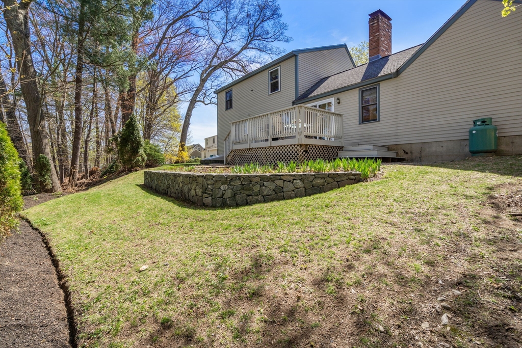 9 Davis Road Hudson, MA 01749 - Photo 32 of 32 a view of a house with a yard