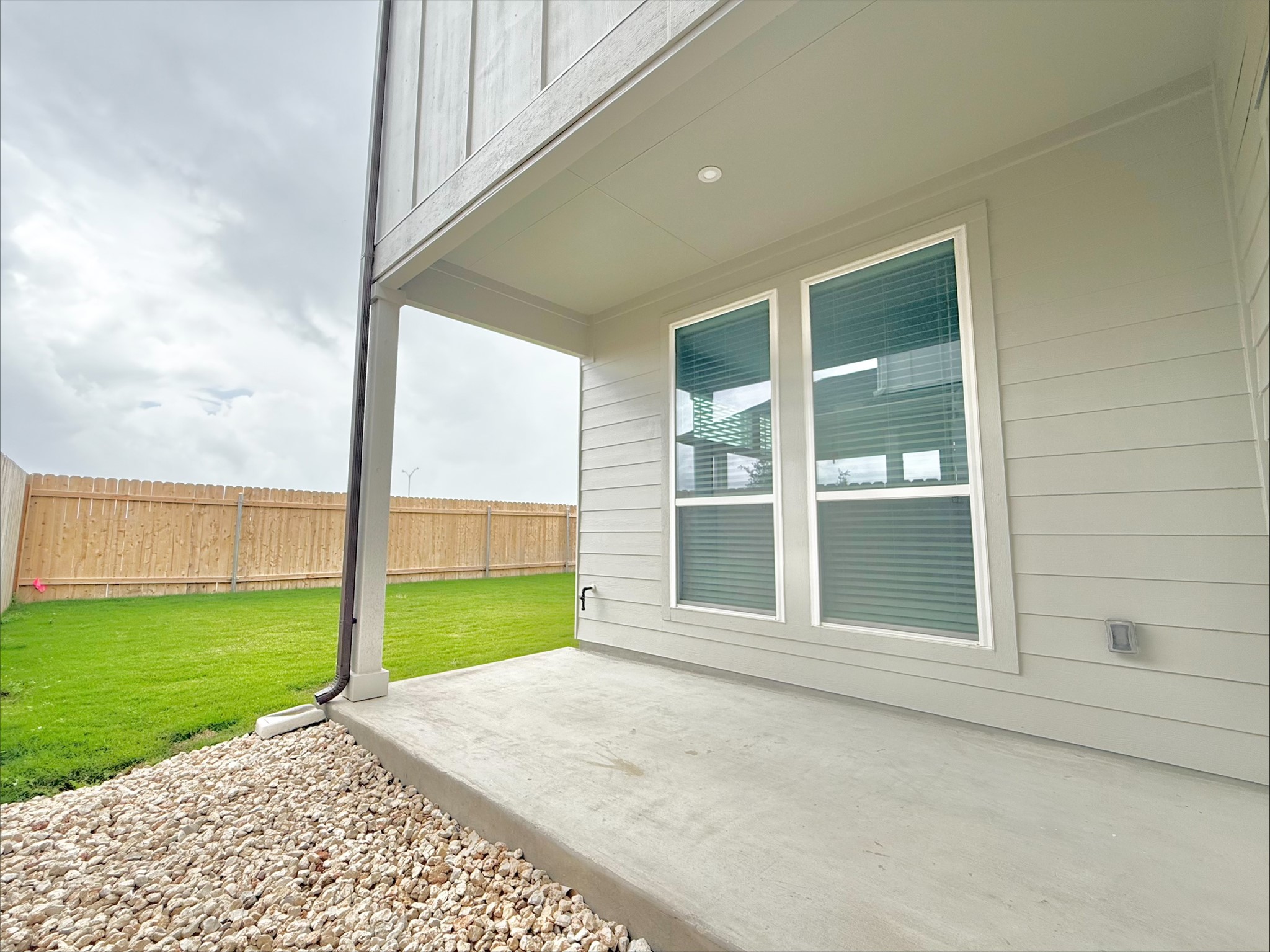 405 Young Street Buda, TX 78610 - Photo 20 of 25 a view of an empty room with a window