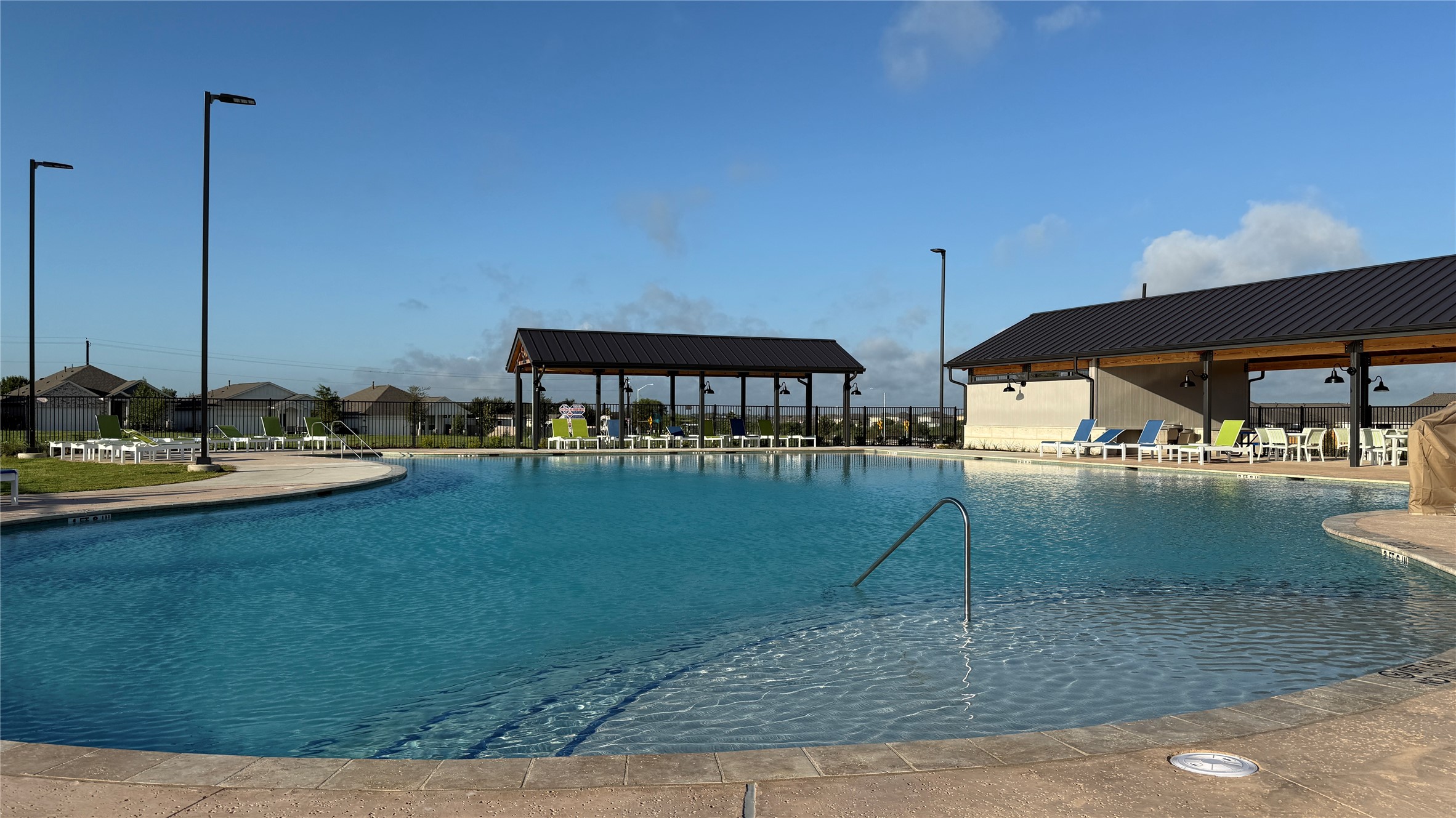 405 Young Street Buda, TX 78610 - Photo 24 of 25 a view of a swimming pool with a yard