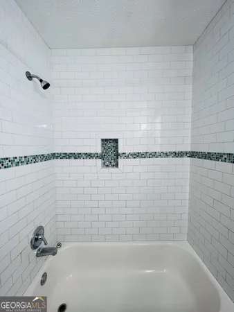 a bathroom with a bathtub