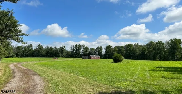 a view of building with trees in the background