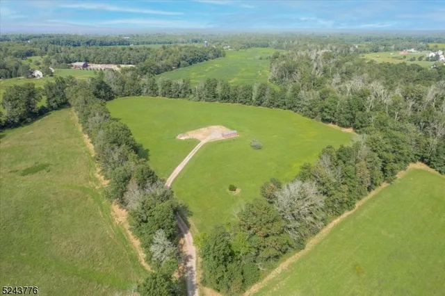 a view of a lake with a yard