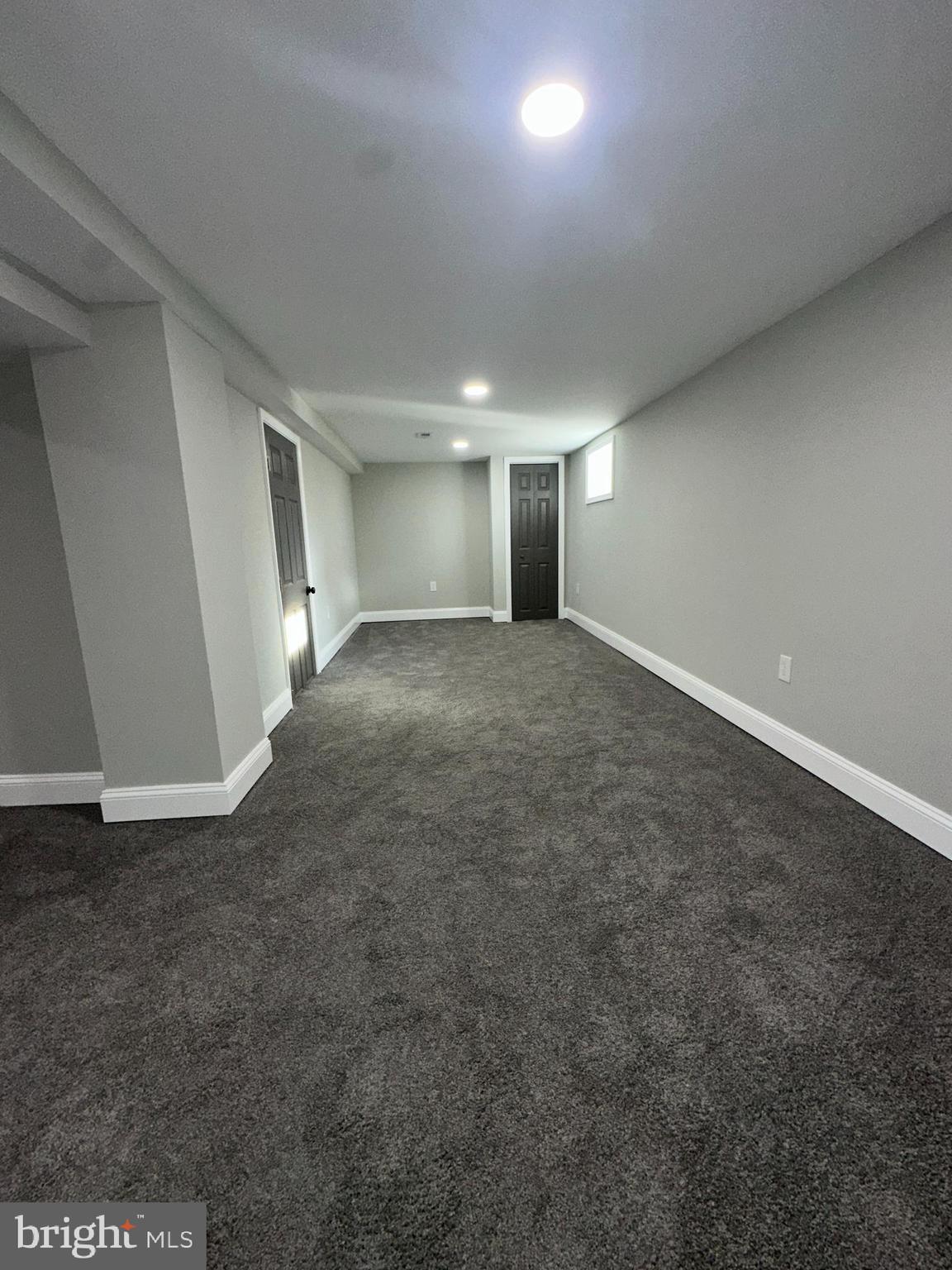 310 Audrey Avenue Baltimore, MD 21225 - Photo 26 of 35 a view of empty room with window and fireplace