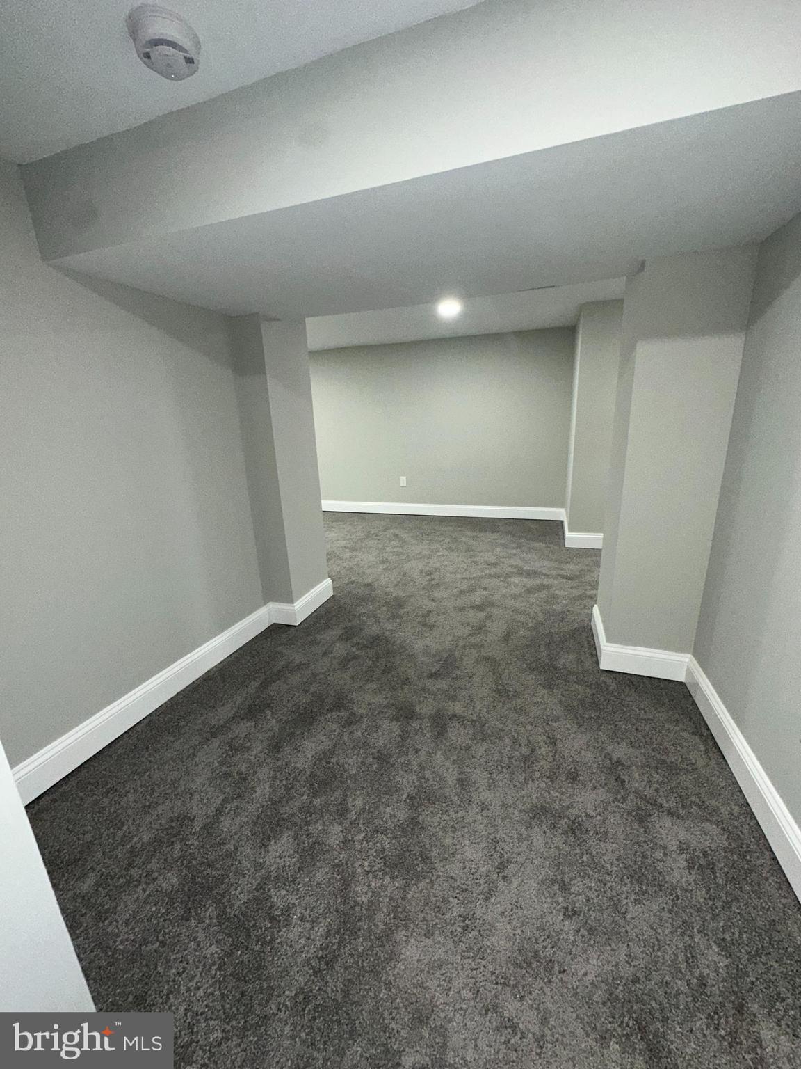 310 Audrey Avenue Baltimore, MD 21225 - Photo 32 of 35 an empty room with a bench