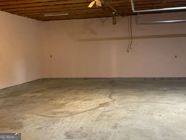 a view of a room with a large window