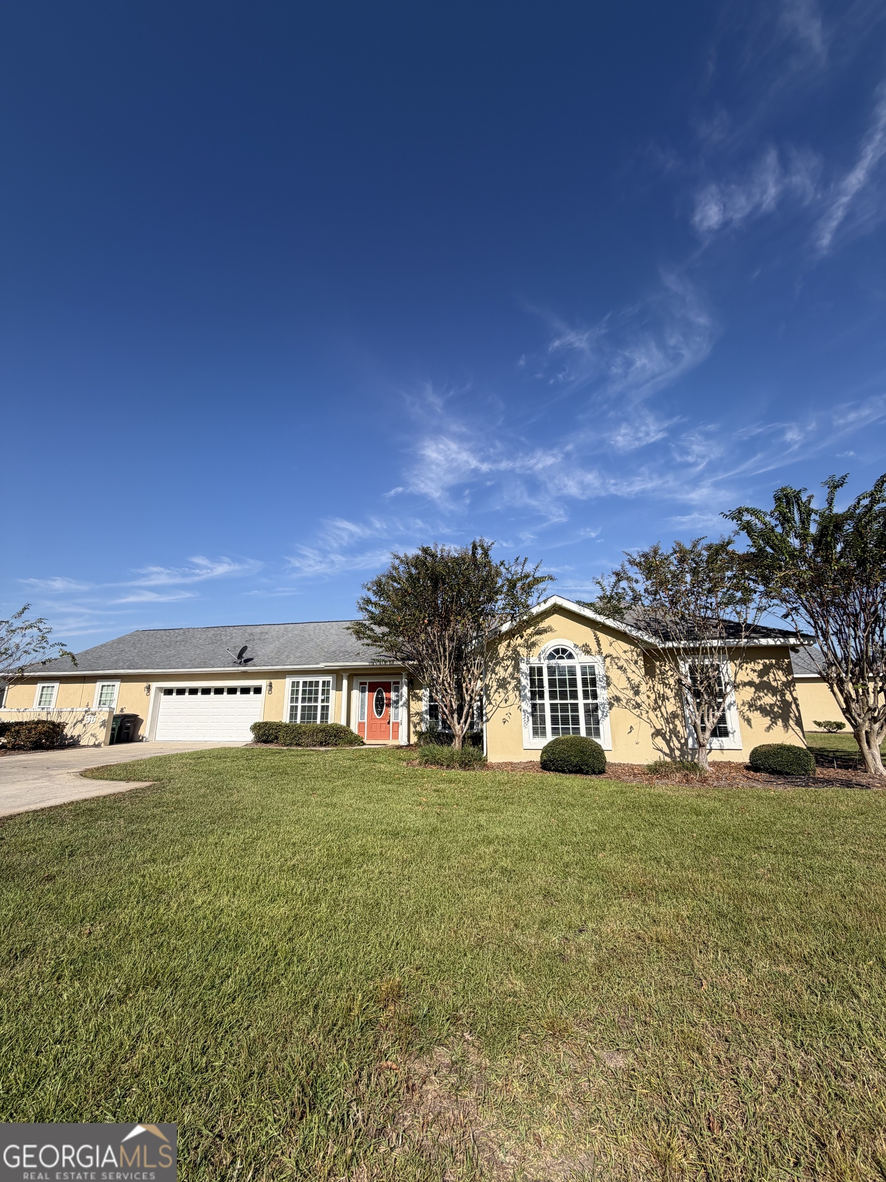 36 Coastal Walk St. Marys, GA 31558 - Photo 2 of 40 a view of a house with yard and porch