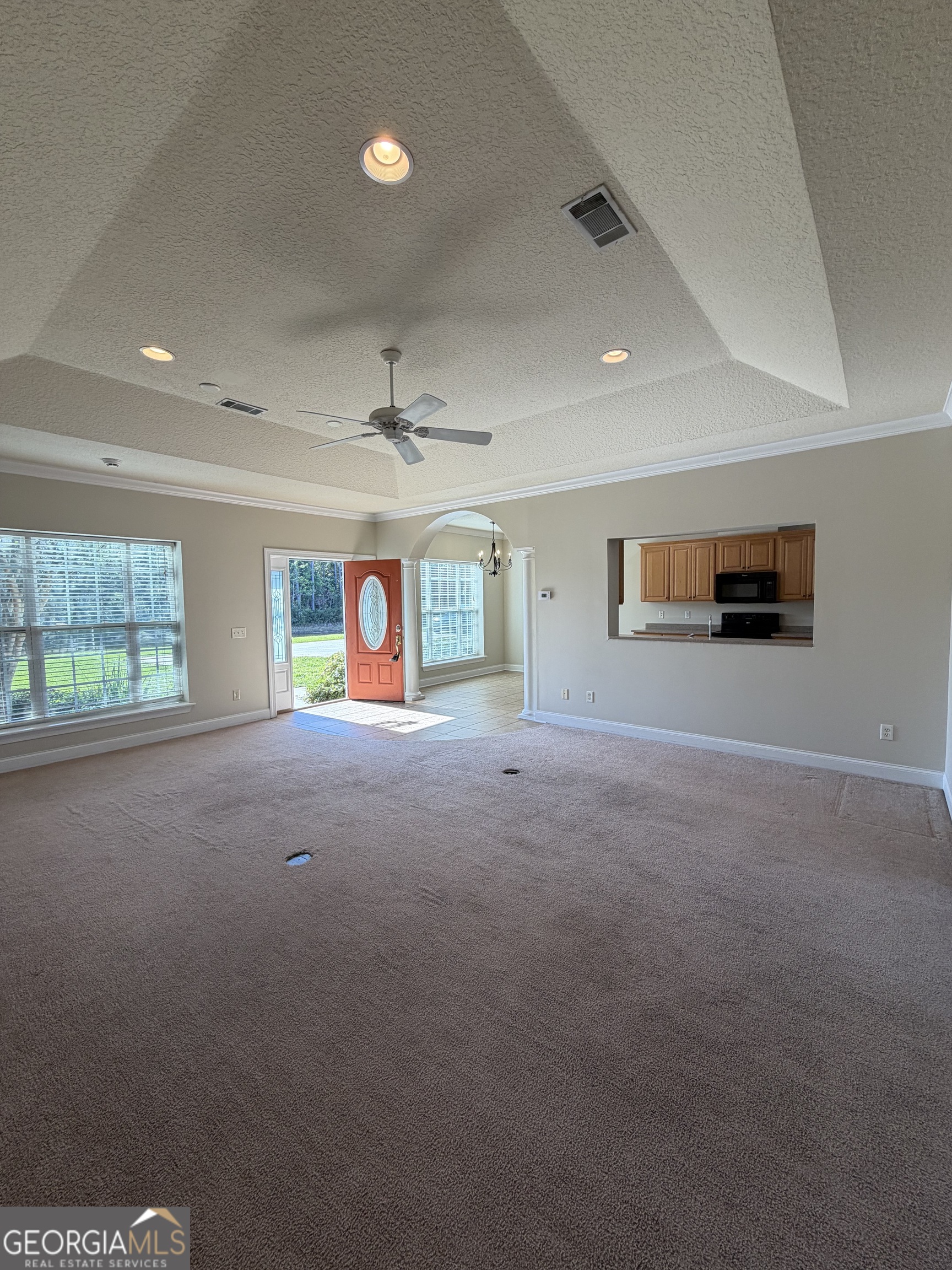 36 Coastal Walk St. Marys, GA 31558 - Photo 7 of 40 a living room with furniture and a ceiling fan