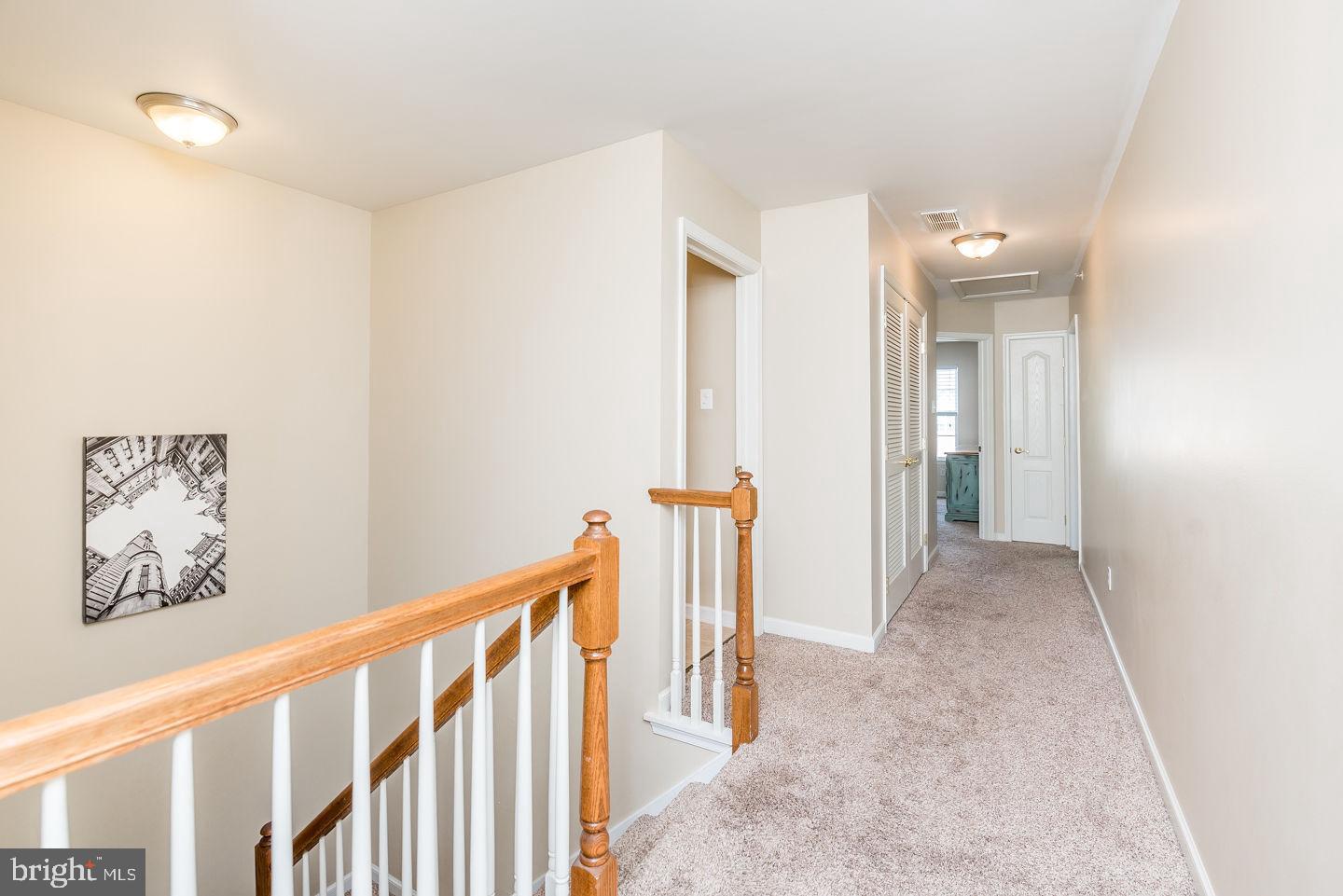 4609 Old Oak Road Doylestown, PA 18902 - Photo 17 of 26 Hallway with Laundry on 2nd Floor