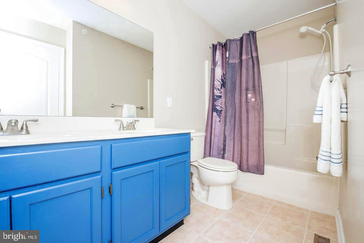 4609 Old Oak Road Doylestown, PA 18902 - Photo 20 of 26 Full Bathroom with Double Sink Vanity & Tile
