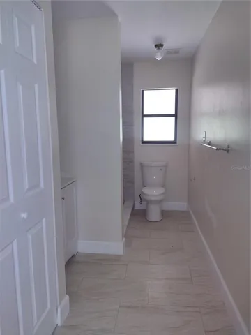 a bathroom with a toilet