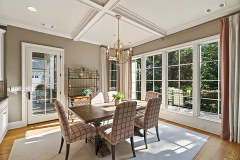 a bedroom with a bed and a chair