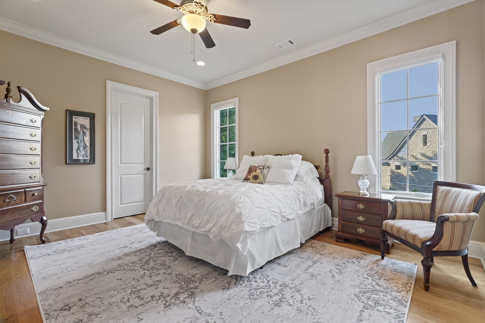 8127 Mountaintop Drive College Grove, TN 37046 - Photo 38 of 72 a bedroom with a bed and a chair