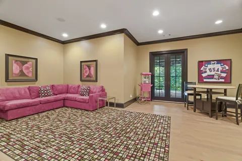an aerial view of residential houses with outdoor space and street view
