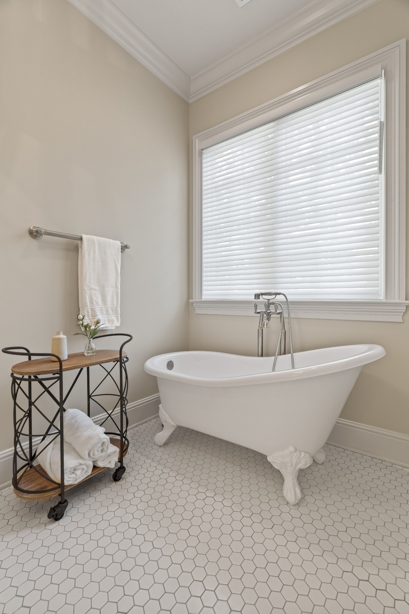 8127 Mountaintop Drive College Grove, TN 37046 - Photo 64 of 72 a spacious bathroom with a bathtub and next to a window