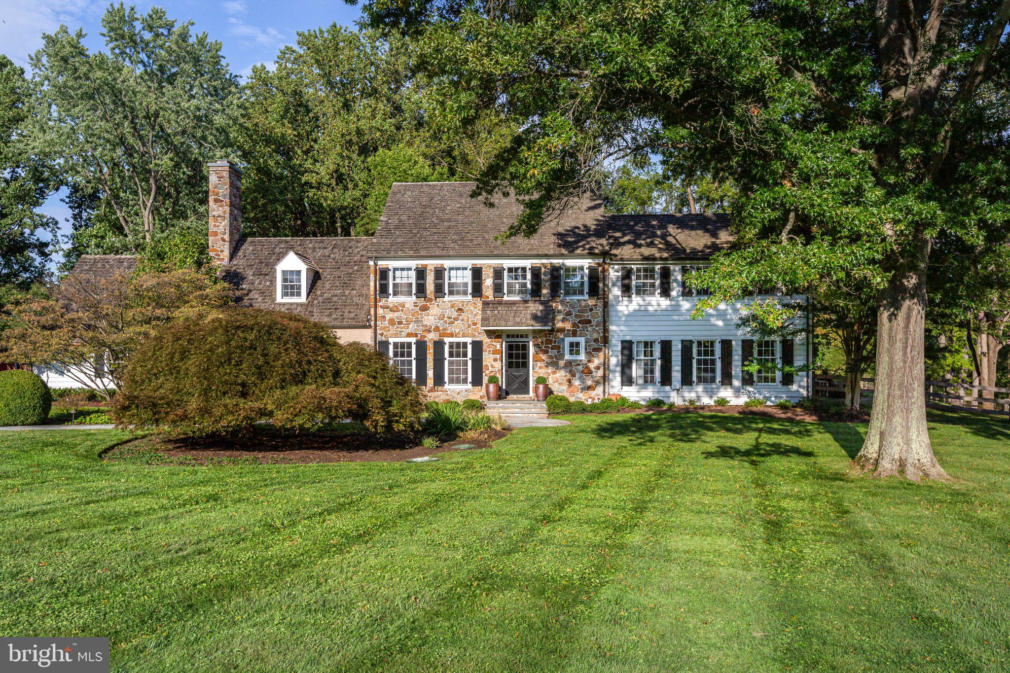 15 Rabbit Run Road Malvern, PA 19355 - Photo 1 of 55 Timeless Stone and Siding Curb Appeal