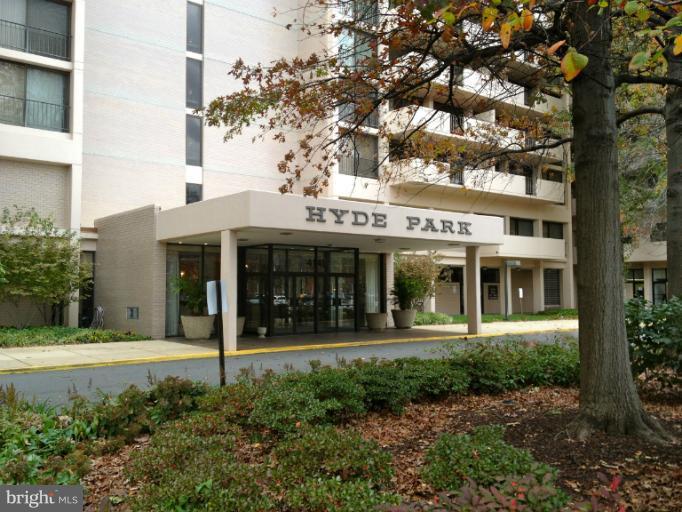 a front view of a building with garden