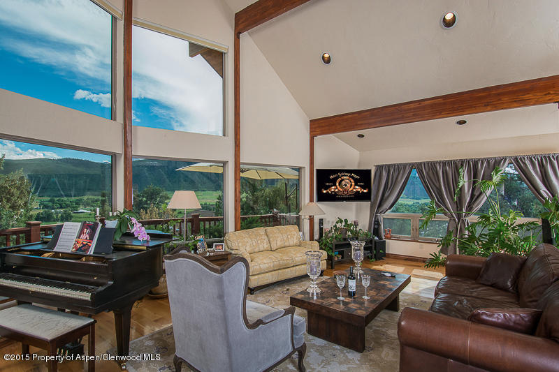 543 Original Basalt, CO 81621 - Photo 1 of 24 a living room with couch a large window with outer view