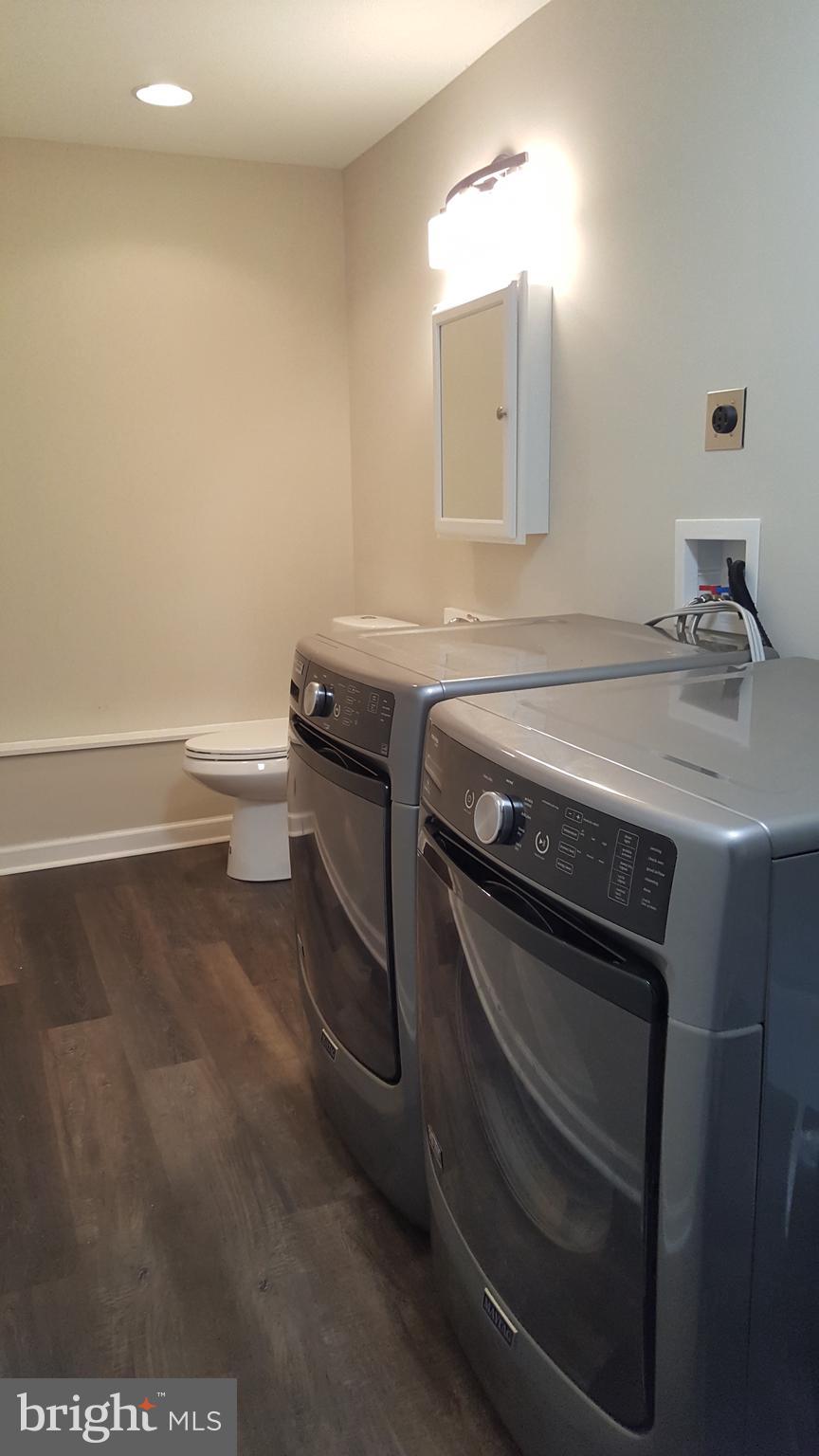 104 Pigpen Point Road Queenstown, MD 21658 - Photo 39 of 41 Separate Laundry Room w/half bath off garage & FR