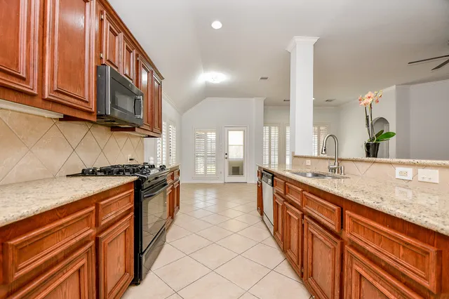 a view of a room with shelf on the wall