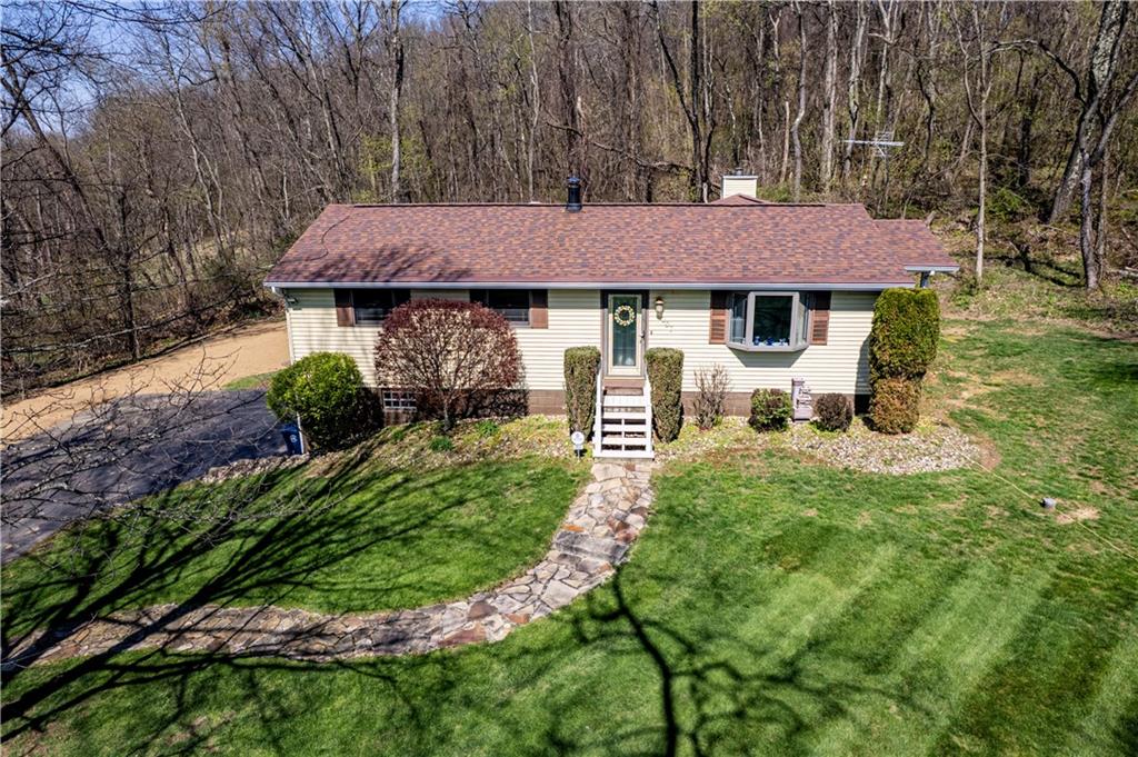 2037 Ridge Road Jeannette, PA 15644 - Photo 2 of 24 a view of a house with garden