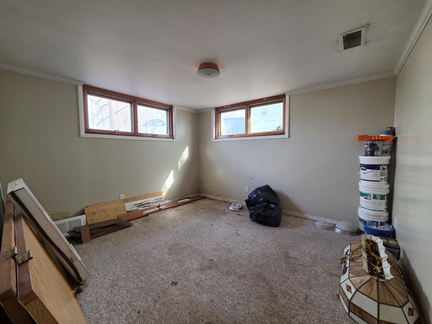 1419 5th Street Camanche, IA 52730 - Photo 11 of 14 a room with a closet and wooden floor