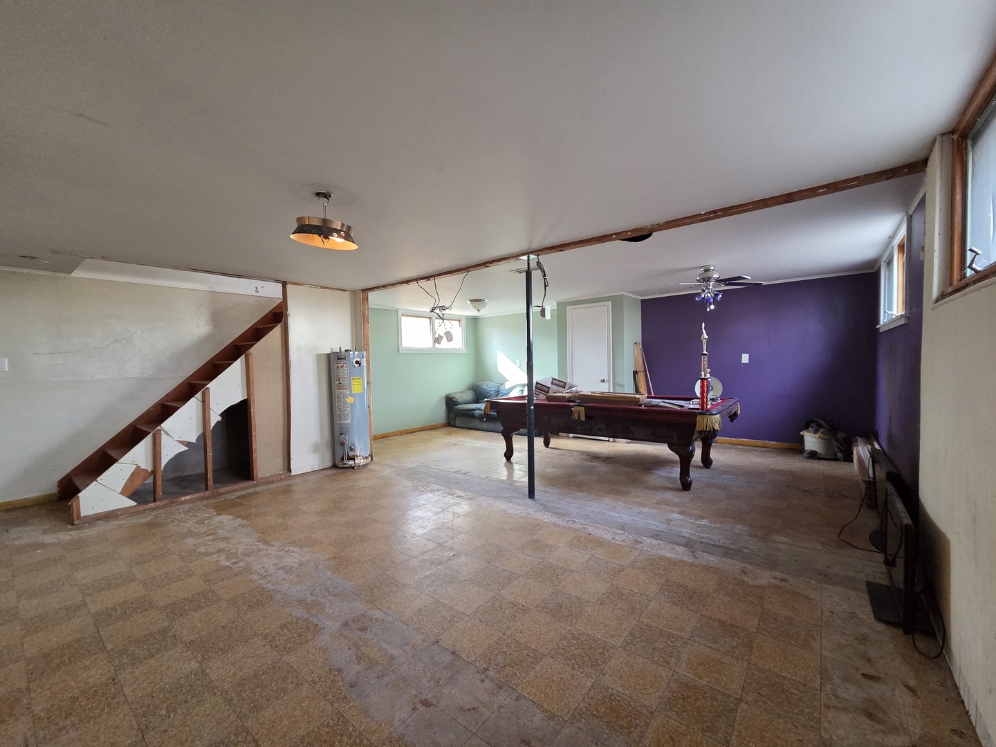 1419 5th Street Camanche, IA 52730 - Photo 12 of 14 a view of an empty room with windows