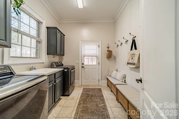 a kitchen with a sink stove and refrigerator