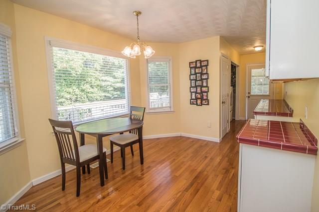 1113 Oak Ridge Church Road Hays, NC 28635 - Photo 18 of 43 Breakfast nook overlooks the deck and pool