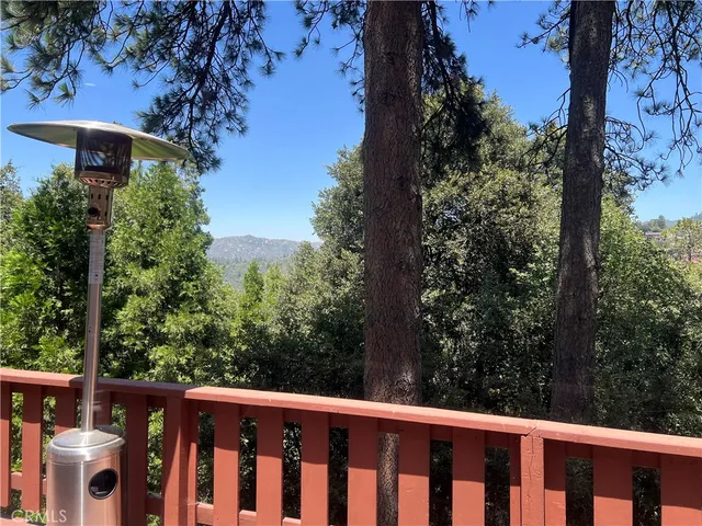 a view of a wooden fence