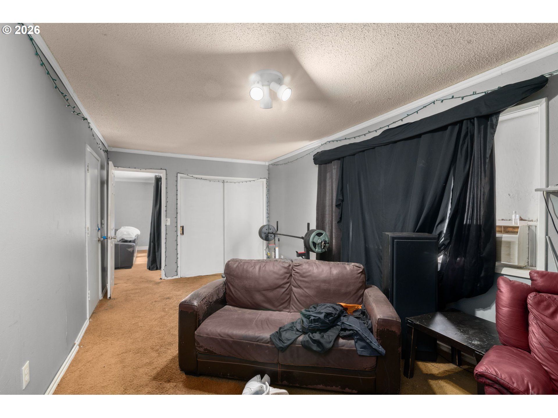 13670 Southwest 21st Street Beaverton, OR 97008 - Photo 11 of 26 a living room with furniture and a flat screen tv