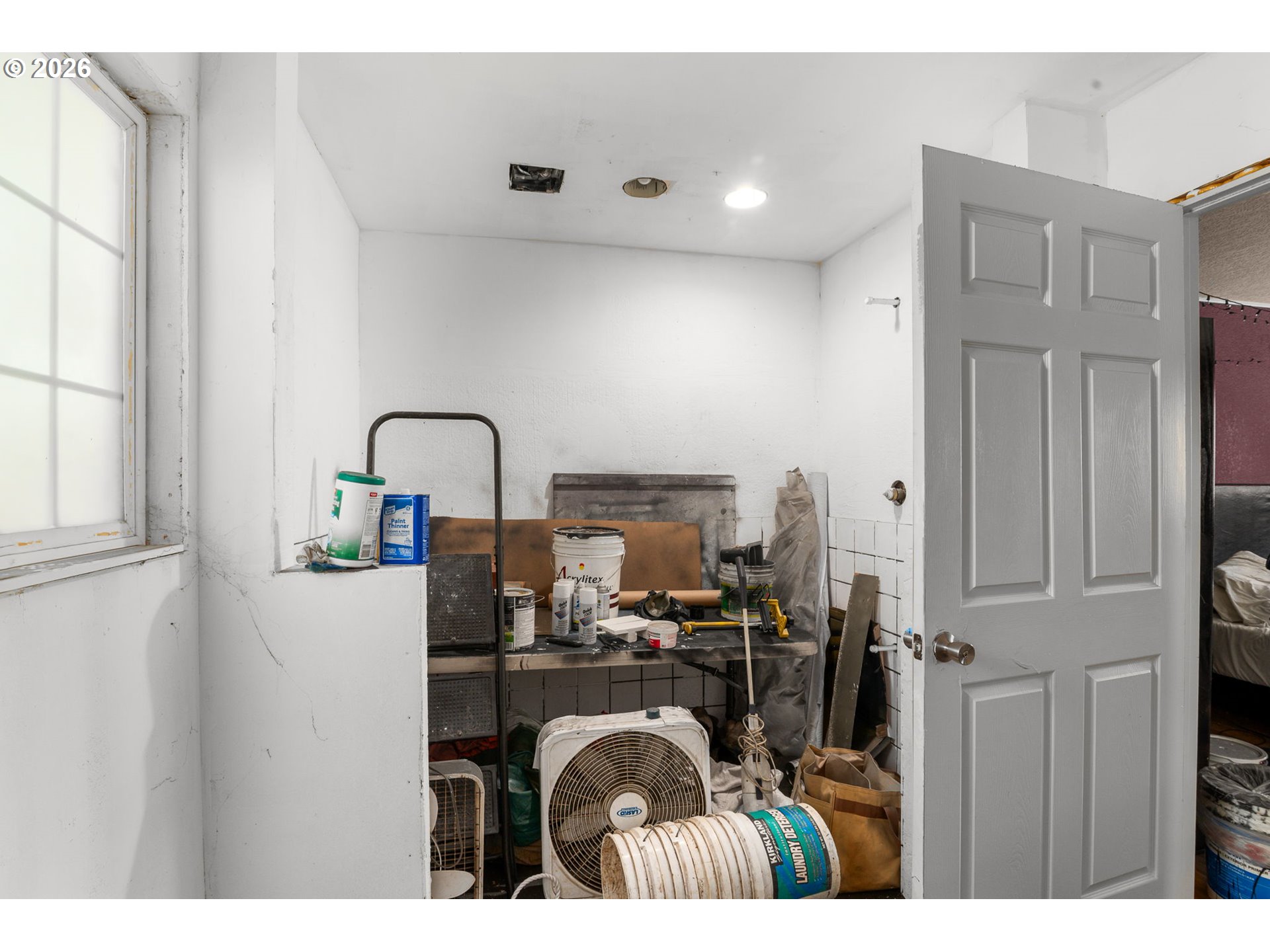 13670 Southwest 21st Street Beaverton, OR 97008 - Photo 17 of 26 a kitchen with a refrigerator and a window