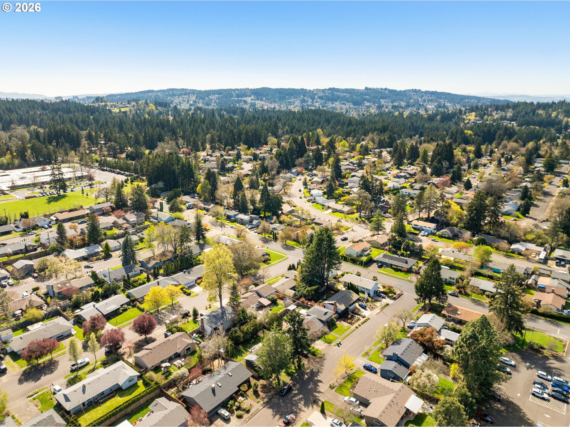 13670 Southwest 21st Street Beaverton, OR 97008 - Photo 25 of 26 a view of a city with mountains in the background