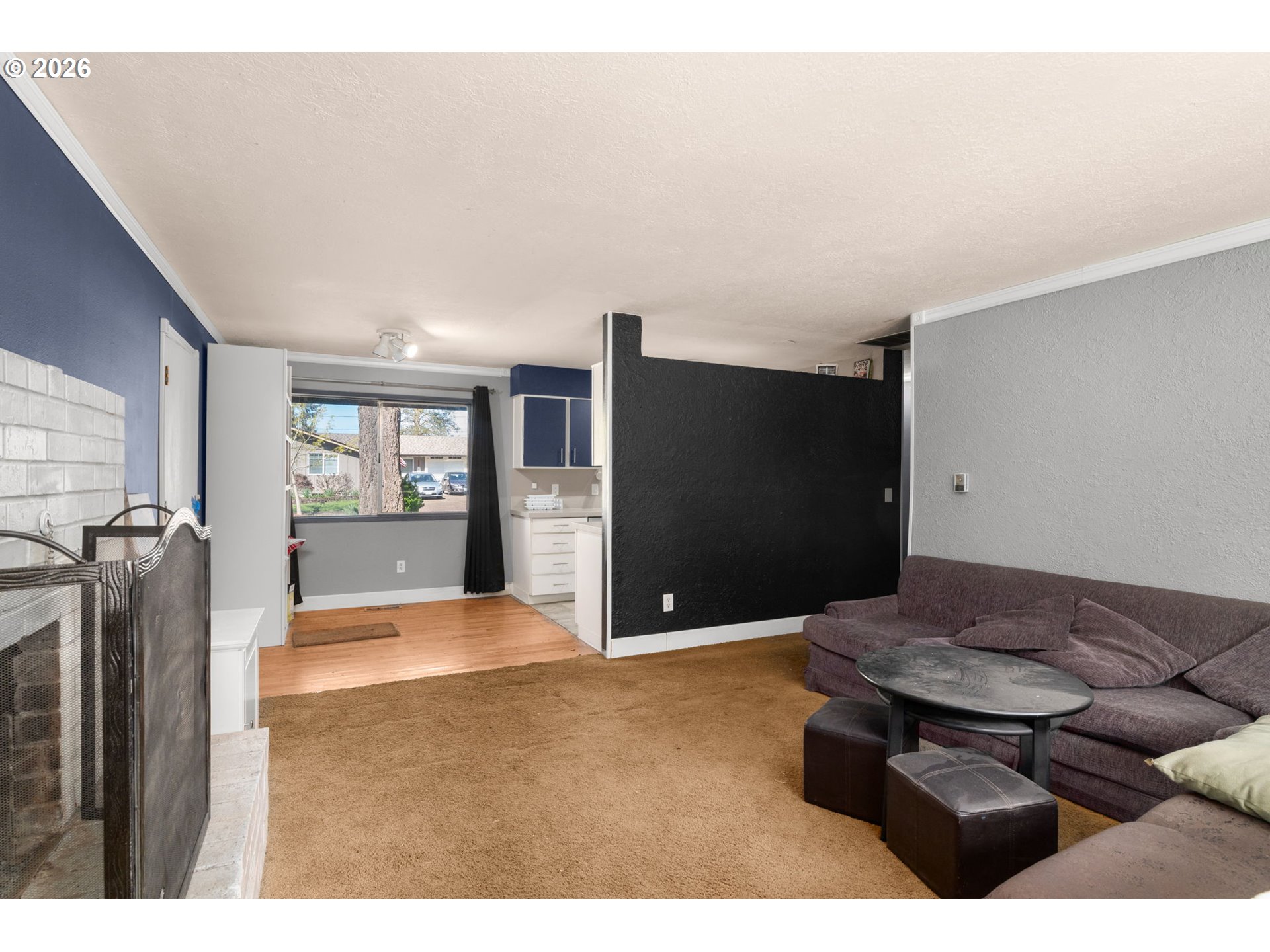 13670 Southwest 21st Street Beaverton, OR 97008 - Photo 9 of 26 a living room with furniture and a flat screen tv