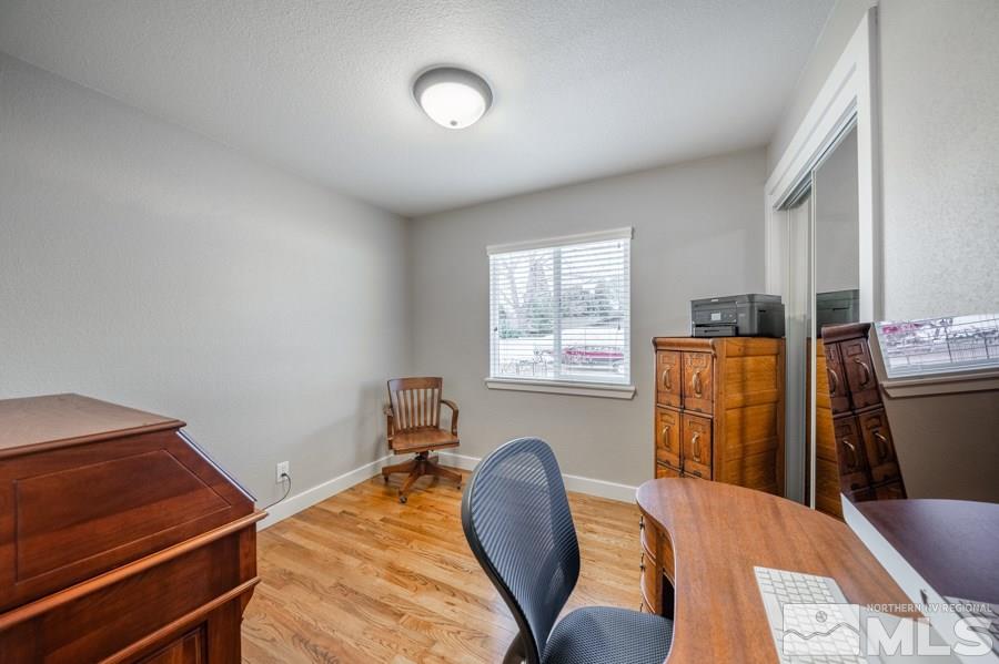 1640 Davidson Way Reno, NV 89509 - Photo 12 of 25 a bedroom with a bed and a window