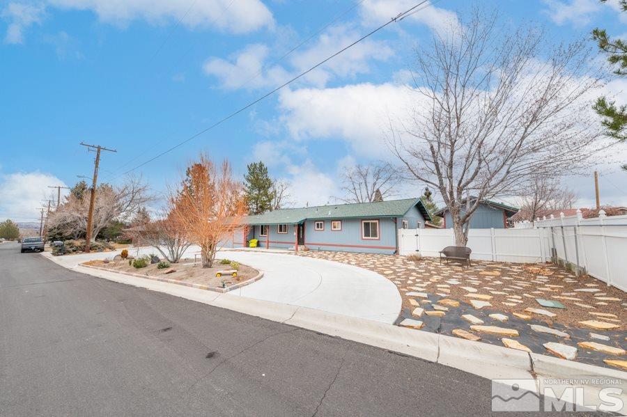 1640 Davidson Way Reno, NV 89509 - Photo 24 of 25 a view of a house with a snow in the yard